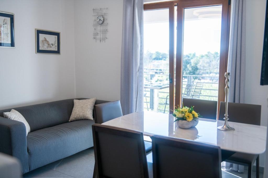 Posedenie v ubytovaní Bella Apartments Zaton