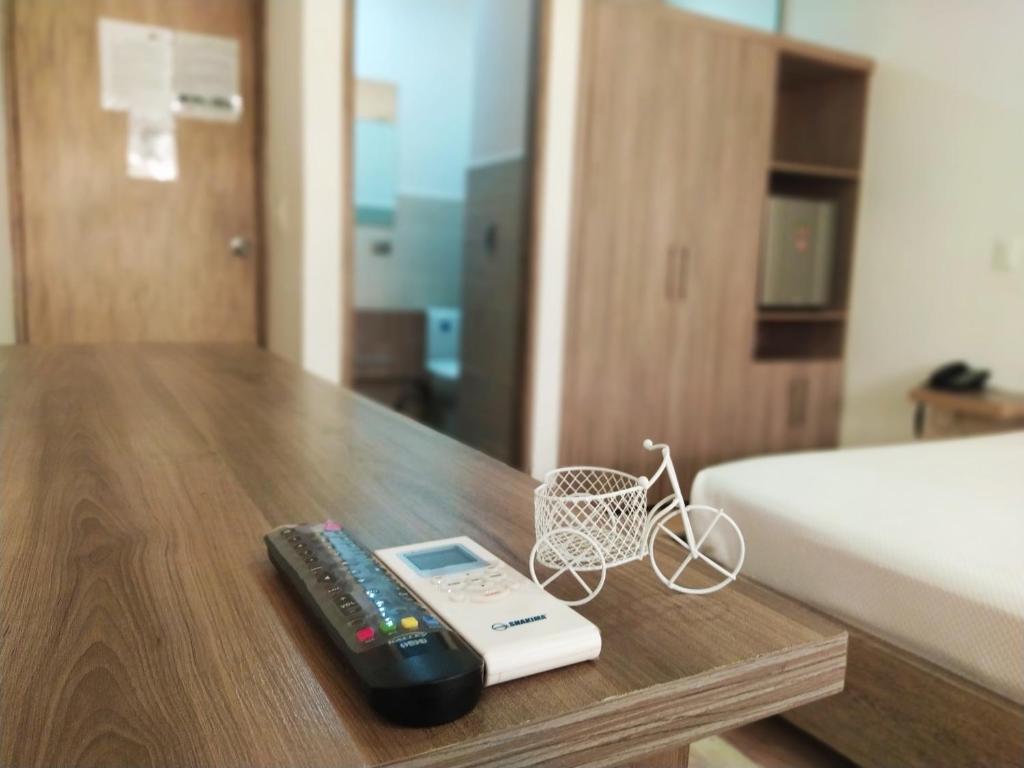 Postel nebo postele na pokoji v ubytování Hotel Barbacoa Uraba