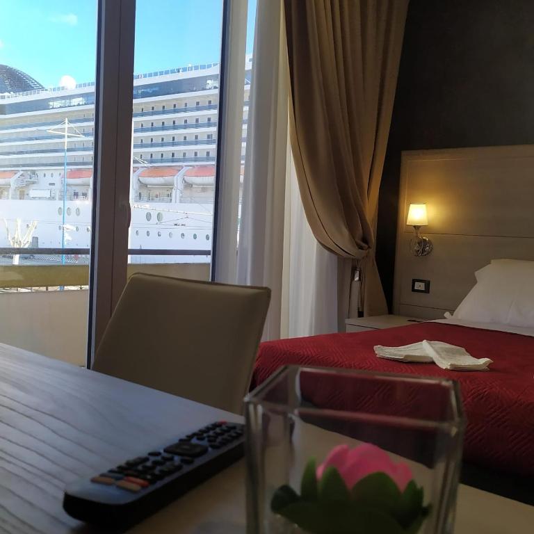 Postel nebo postele na pokoji v ubytování B&B Margherita