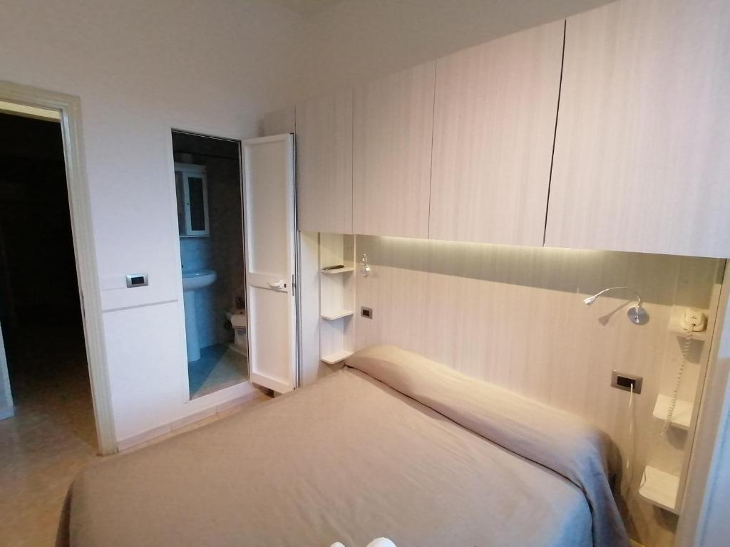 Postel nebo postele na pokoji v ubytování Hotel Cilene