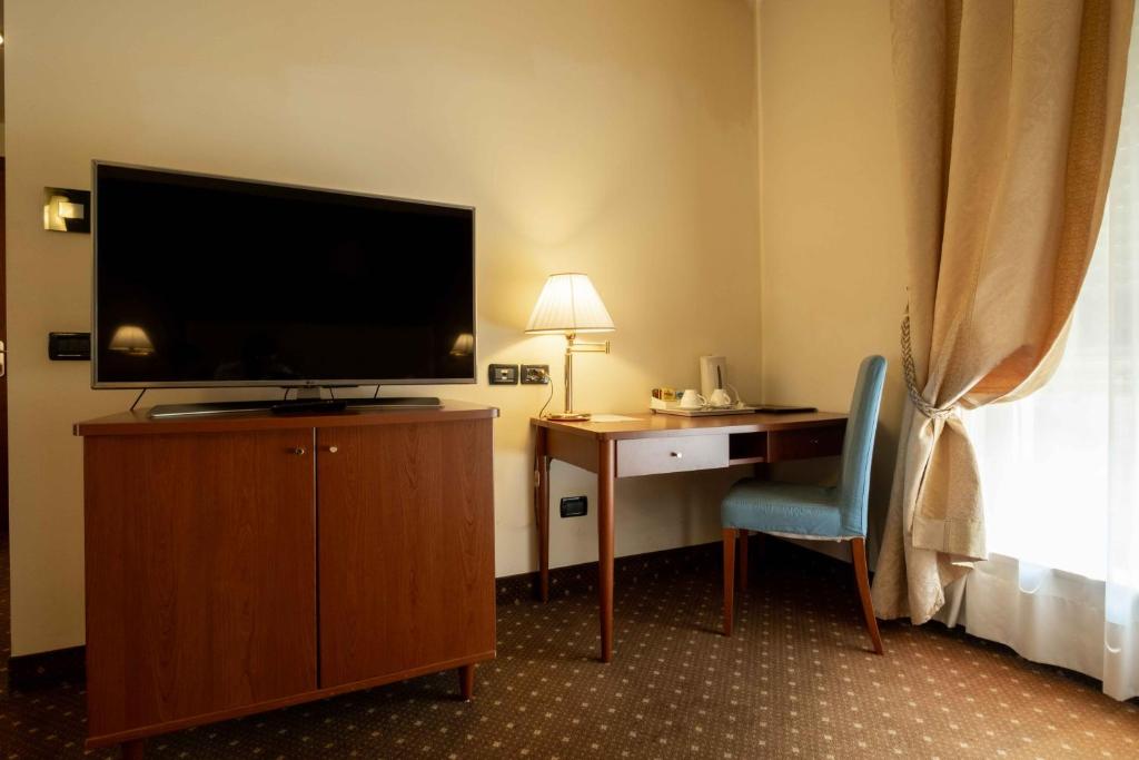 TV a/nebo společenská místnost v ubytování La Pieve Hotel