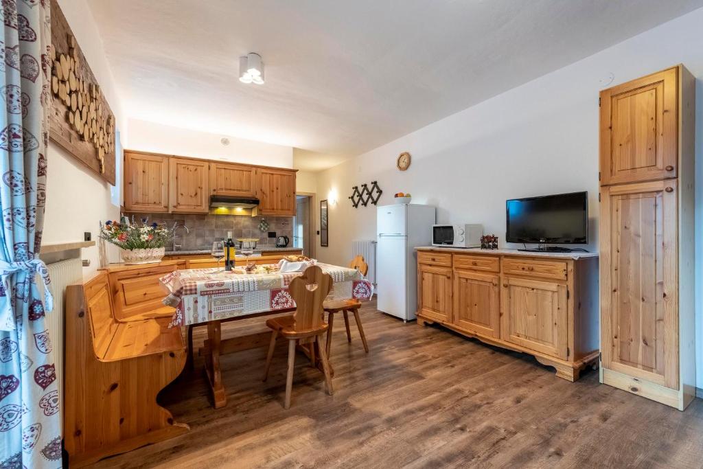 Kuchyň nebo kuchyňský kout v ubytování Appartamenti Residence La Roggia