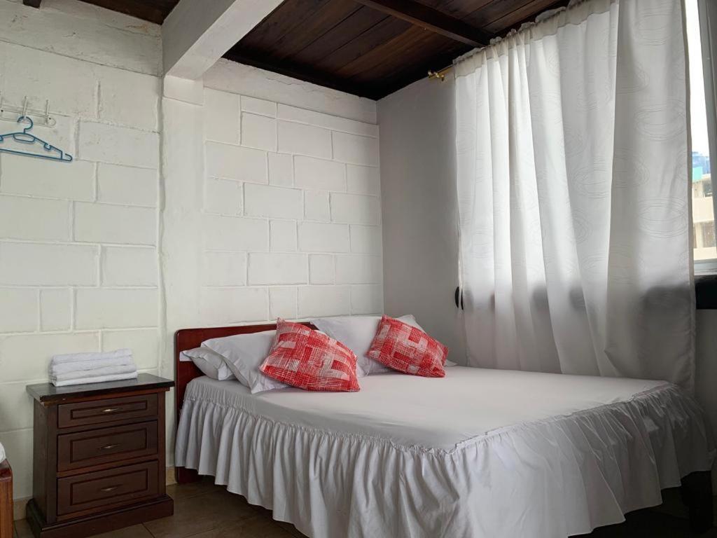 Postel nebo postele na pokoji v ubytování Hotel La Barca
