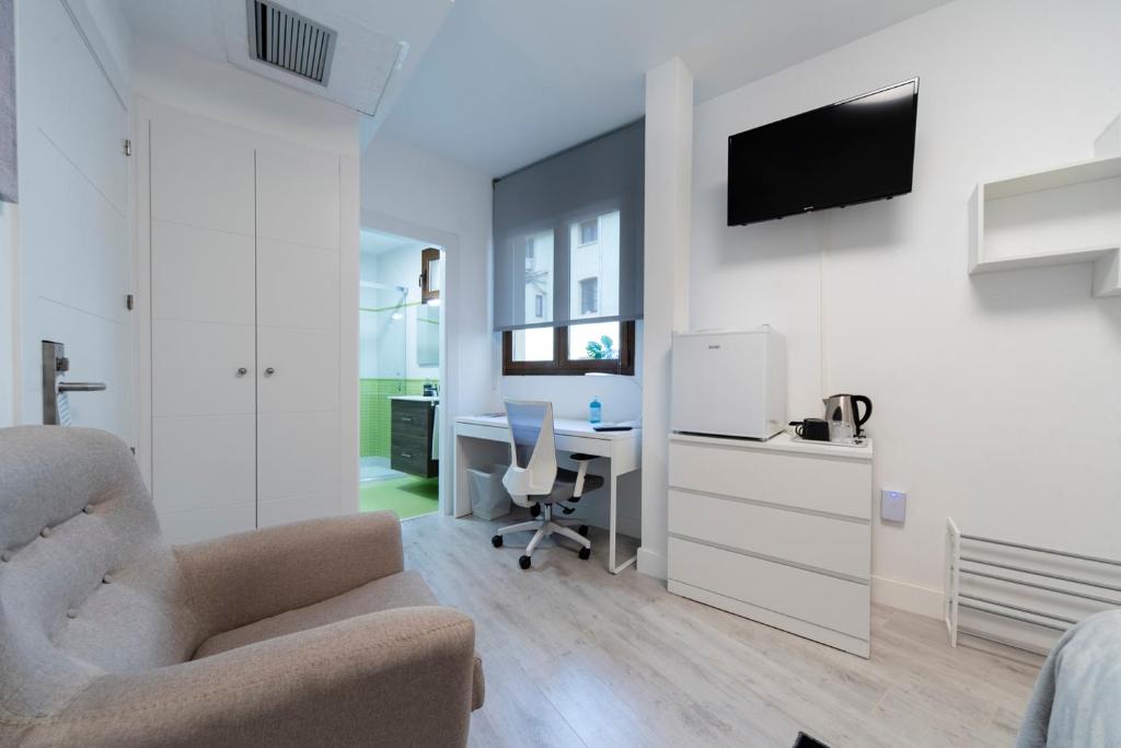 Televiisor ja/või meelelahutuskeskus majutusasutuses Vizcainos Home Away