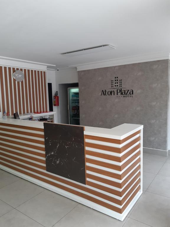a store front with anazon playa sign in a building at Aton Plaza Hotel in Goiânia