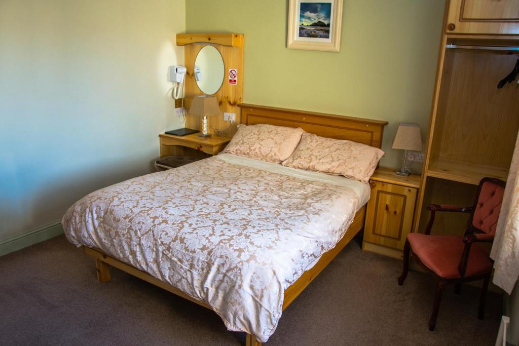 Postel nebo postele na pokoji v ubytování Algret House B&B