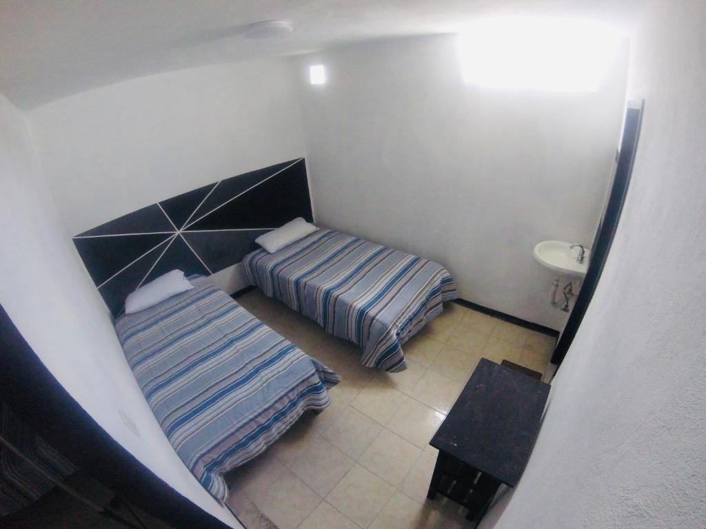 Letto o letti in una camera di Hotelito Ejido
