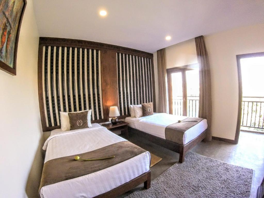 Postel nebo postele na pokoji v ubytování Won Residence & Spa