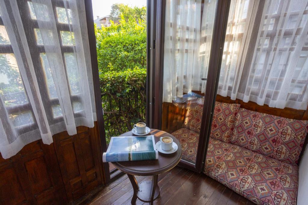 Posezení v ubytování Hotel Villa Daffodil