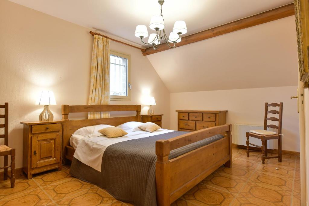 Postel nebo postele na pokoji v ubytování Gite du Clos Champagnac