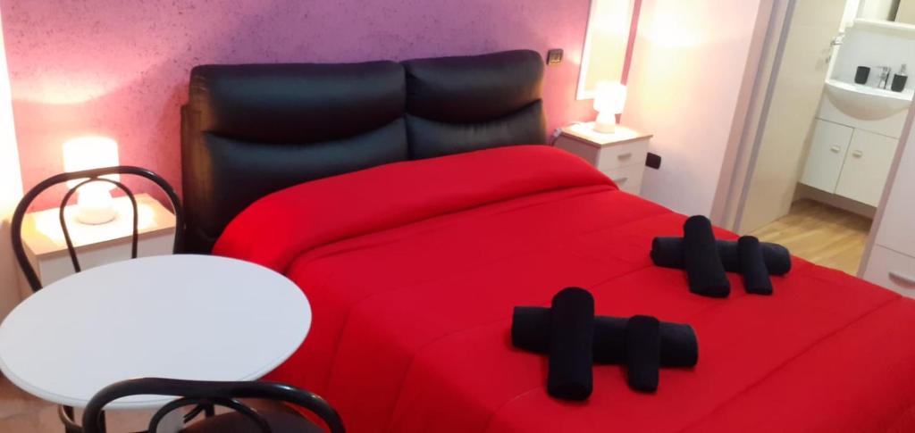 Łóżko lub łóżka w pokoju w obiekcie Guesthouse da Filiberto