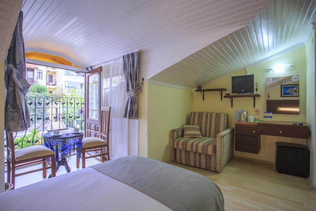 Postel nebo postele na pokoji v ubytování Hotel Villa Daffodil