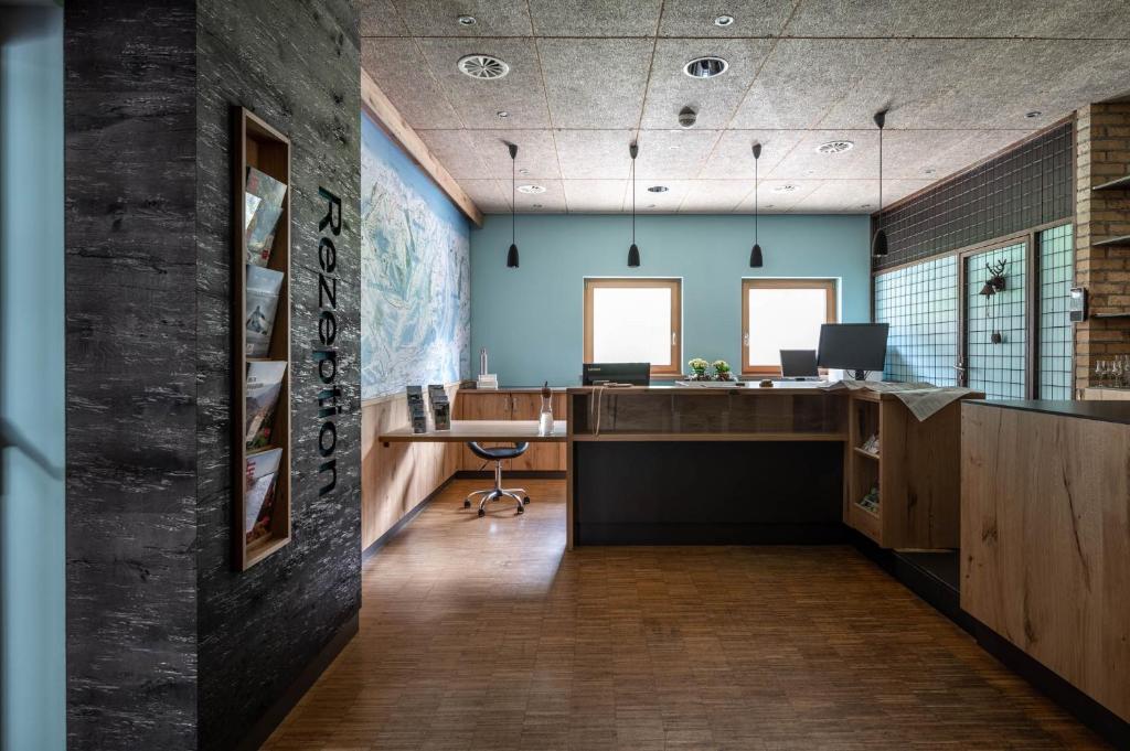 TV a/nebo společenská místnost v ubytování Base Aktivhotel Montafon