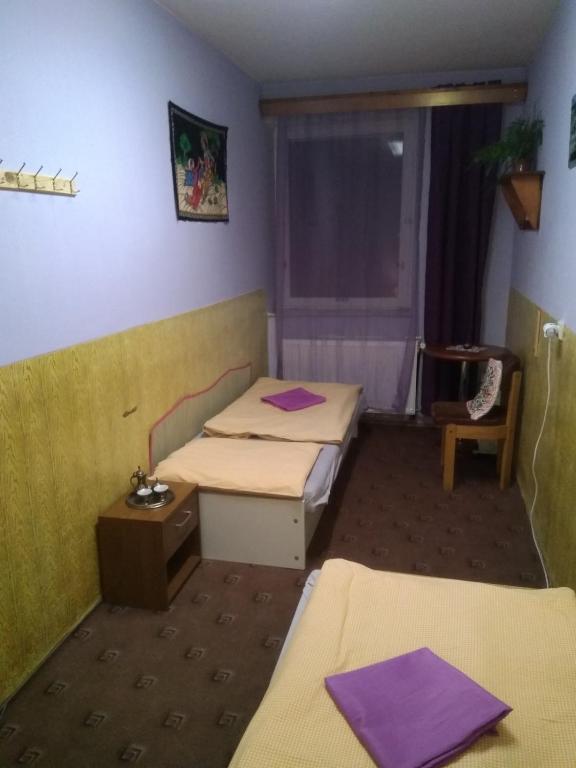 Postel nebo postele na pokoji v ubytování Tatry Liptov