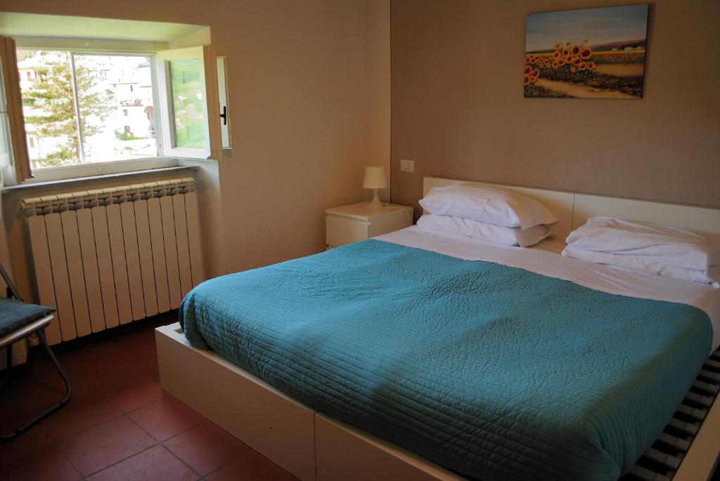 Postel nebo postele na pokoji v ubytování Villa Gherardi - B&B e Hostel