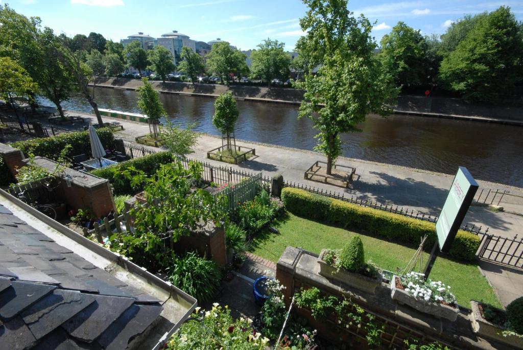 a view of a river from the roof of a building at Abbey Guest House York in York