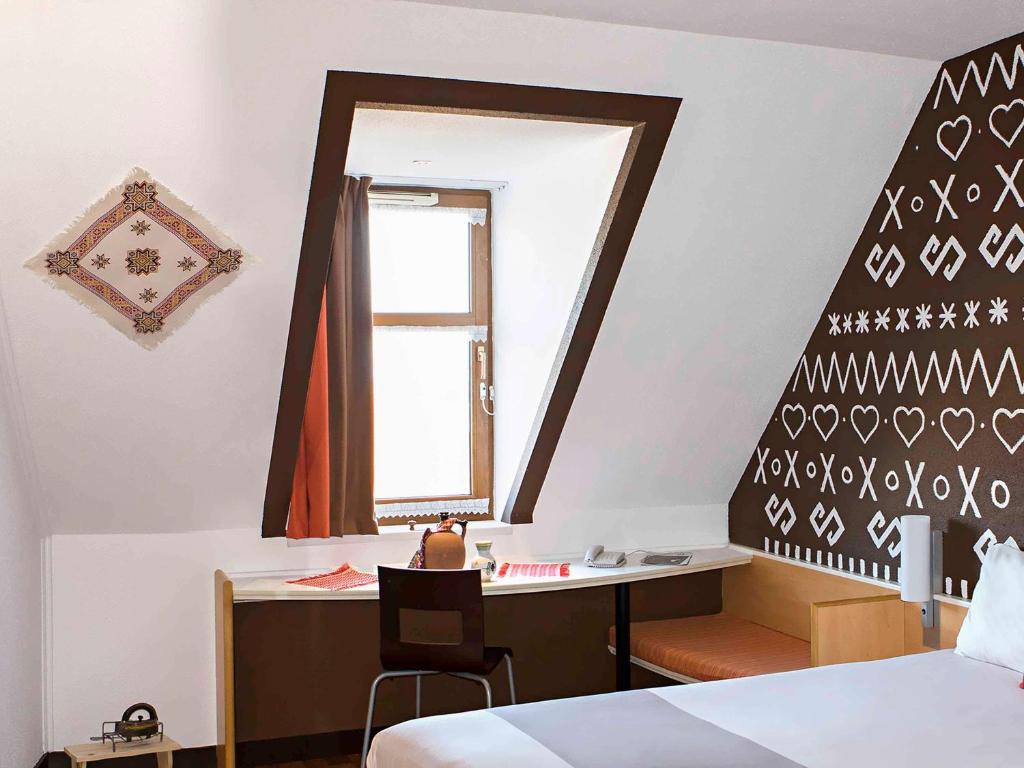 Postel nebo postele na pokoji v ubytování Ibis Bratislava Centrum