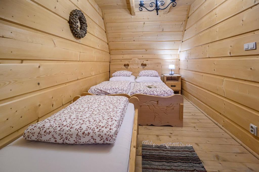 Posteľ alebo postele v izbe v ubytovaní Sun&Ski Maciejówka