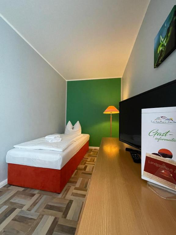 Postel nebo postele na pokoji v ubytování Landgasthaus Zander