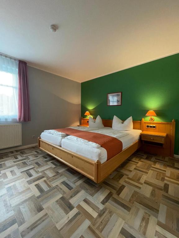 Postel nebo postele na pokoji v ubytování Landgasthaus Zander