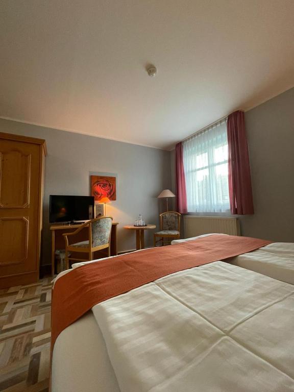 Postel nebo postele na pokoji v ubytování Landgasthaus Zander