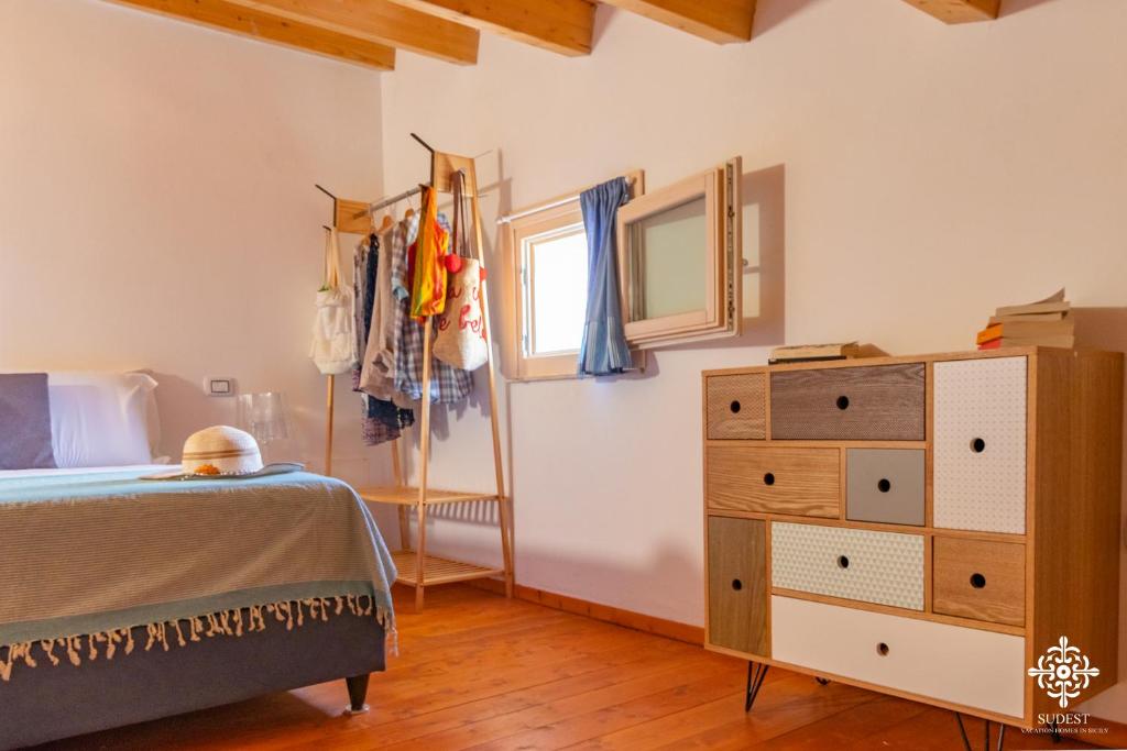 Postel nebo postele na pokoji v ubytování Beach Front Villas
