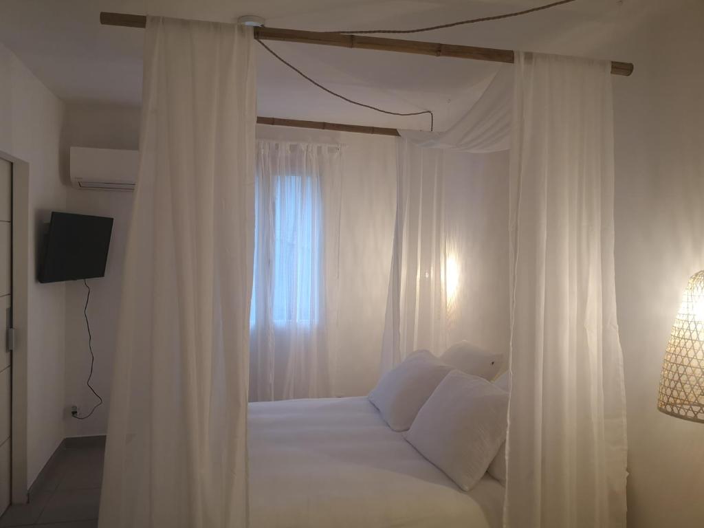 Postel nebo postele na pokoji v ubytování Une Nuit à Bali - Appartement cocooning