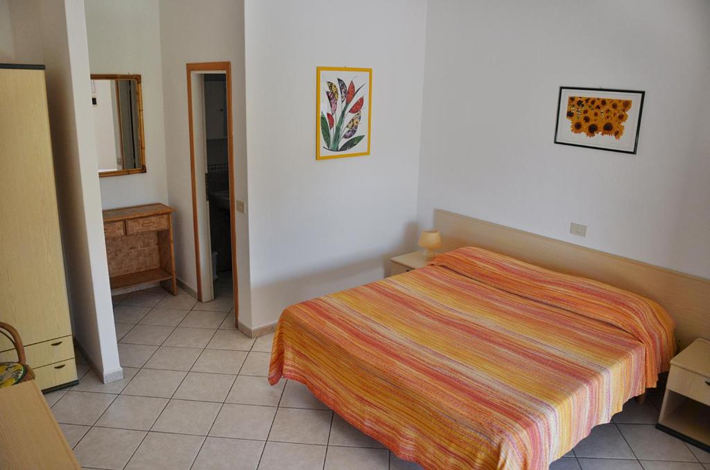 Postel nebo postele na pokoji v ubytování Villa dei Limoni