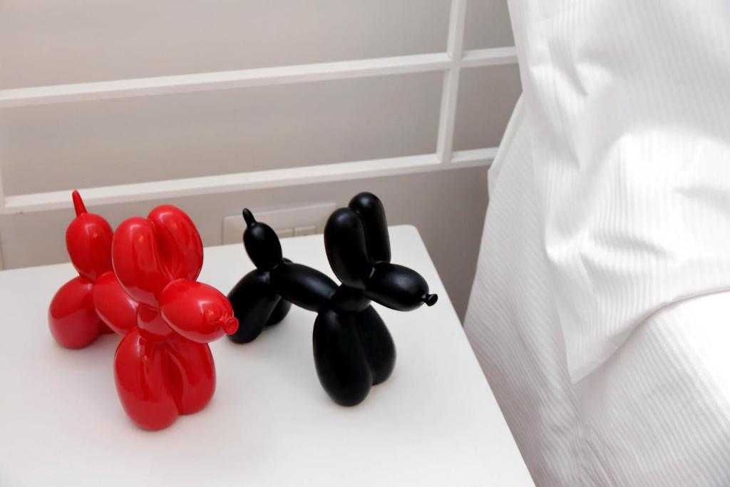 Posteľ alebo postele v izbe v ubytovaní B&G Navona Apartment