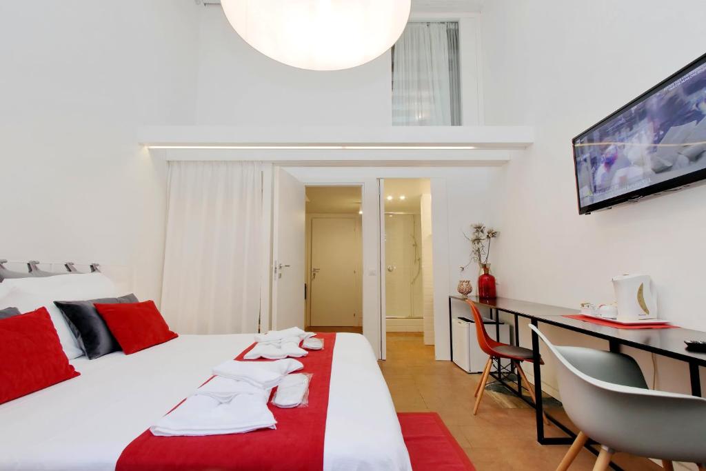 Posteľ alebo postele v izbe v ubytovaní B&G Navona Apartment