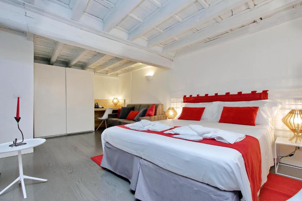 Posteľ alebo postele v izbe v ubytovaní B&G Navona Apartment