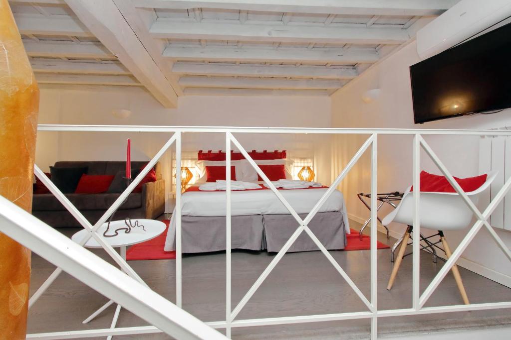Posteľ alebo postele v izbe v ubytovaní B&G Navona Apartment