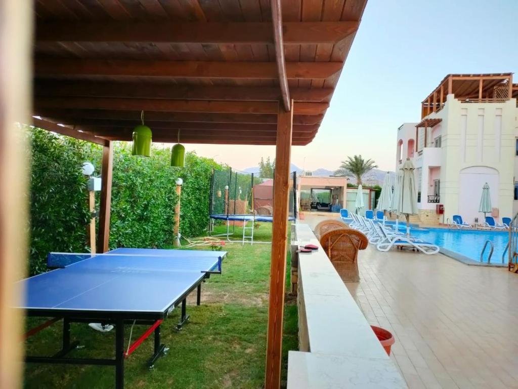 Bazén v ubytování 4S Hotel Dahab nebo v jeho okolí