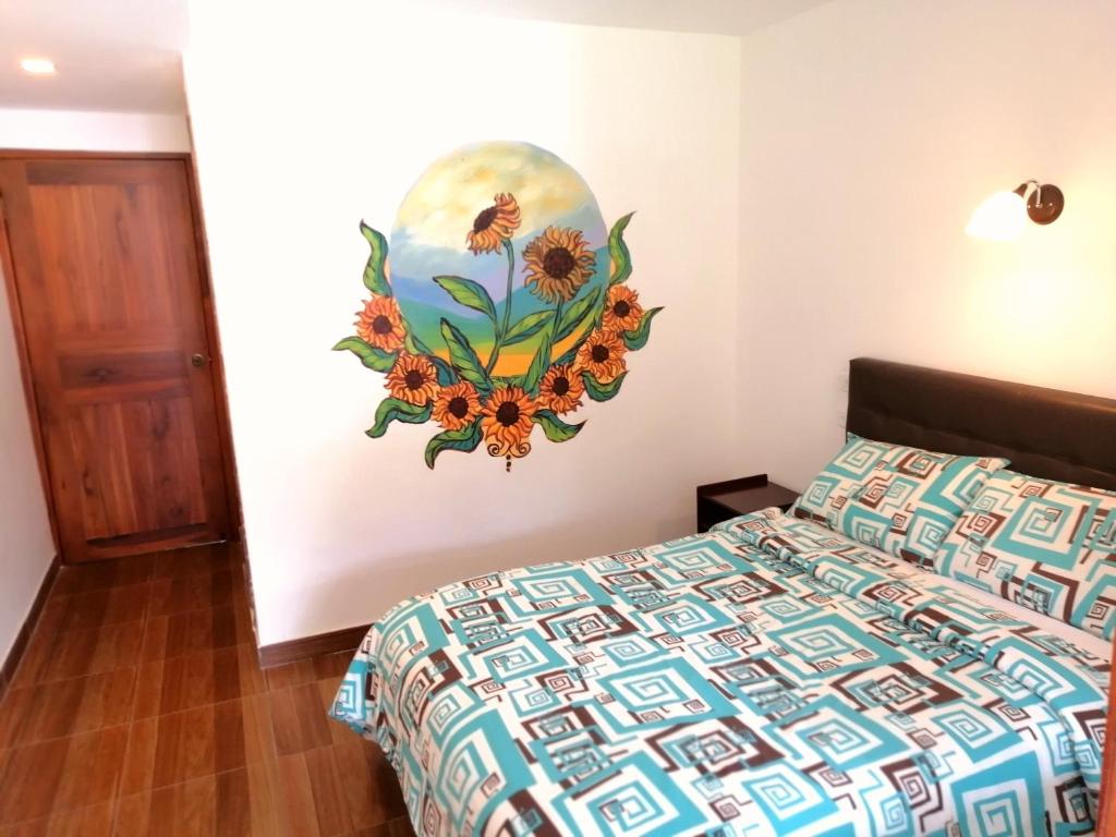 Postel nebo postele na pokoji v ubytování Hostal & Spa Casa Real