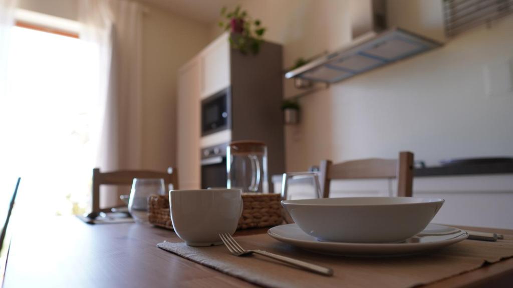 Televízia a/alebo spoločenská miestnosť v ubytovaní B&B La Veranda