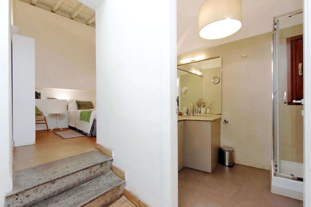 Posteľ alebo postele v izbe v ubytovaní B&G Navona Apartment