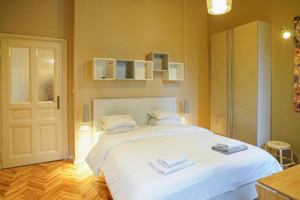 Postel nebo postele na pokoji v ubytování ComfortZone Zagreb center apartment