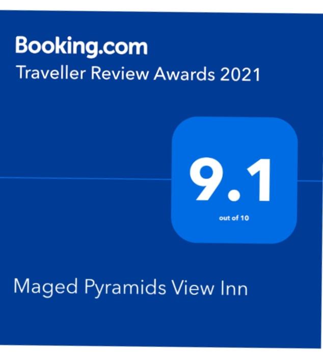 Certificato, attestato, insegna o altro documento esposto da Maged Pyramids View Inn