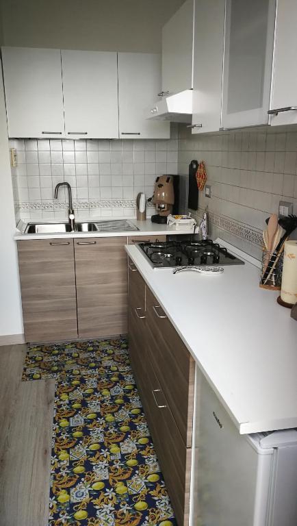 Kuchyň nebo kuchyňský kout v ubytování La Marocella
