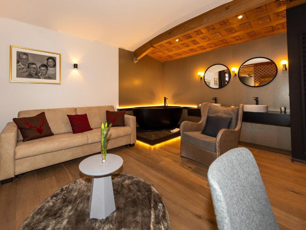 Posezení v ubytování Hotel Parsenn
