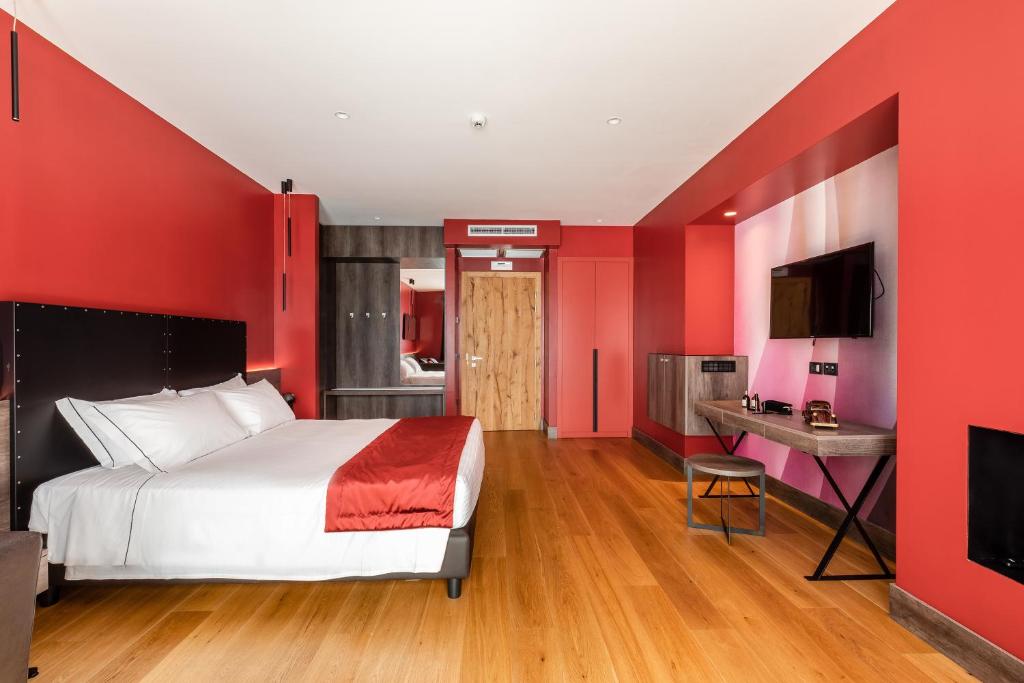 Łóżko lub łóżka w pokoju w obiekcie Anusca Palace Hotel