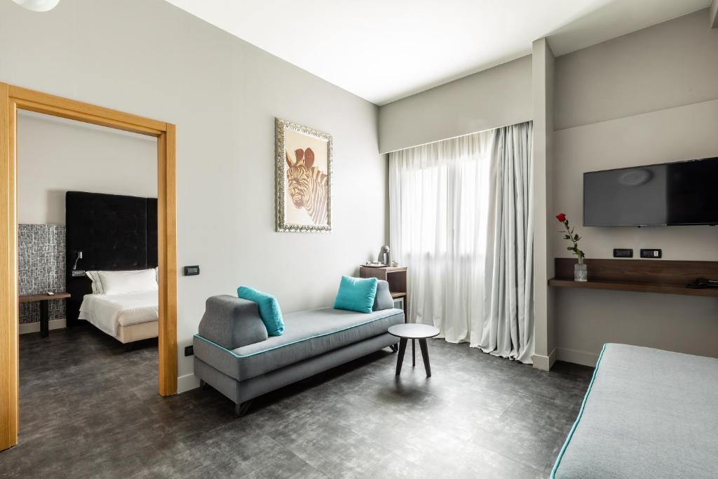 Telewizja i/lub zestaw kina domowego w obiekcie Anusca Palace Hotel
