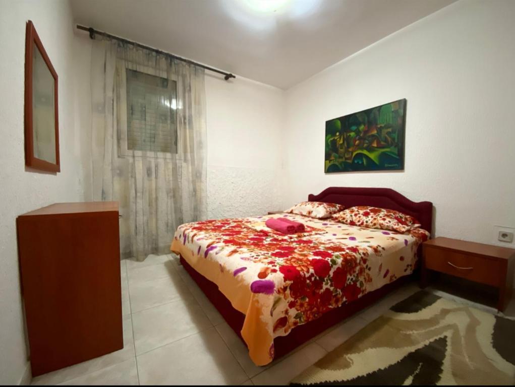 Postel nebo postele na pokoji v ubytování Apartmani Vila Marija