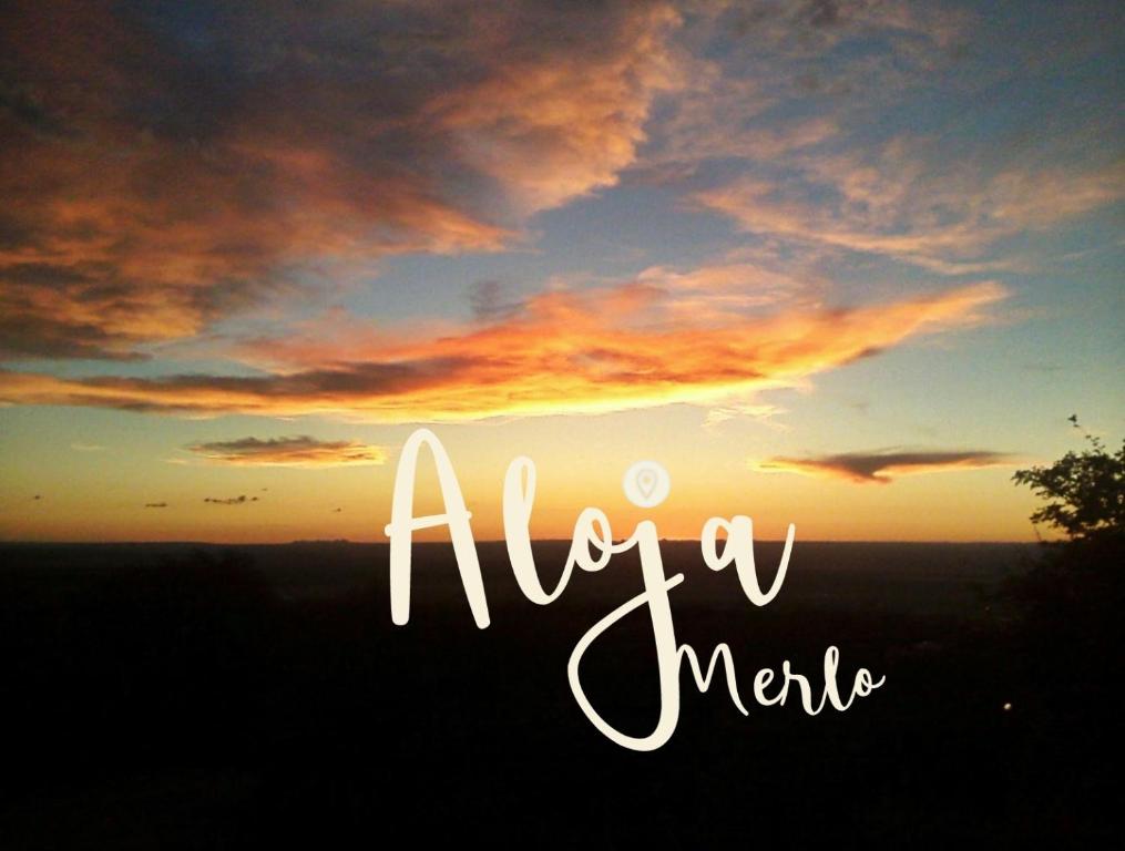 a view of a sunset with the words ahritic at Aloja Merlo in Merlo