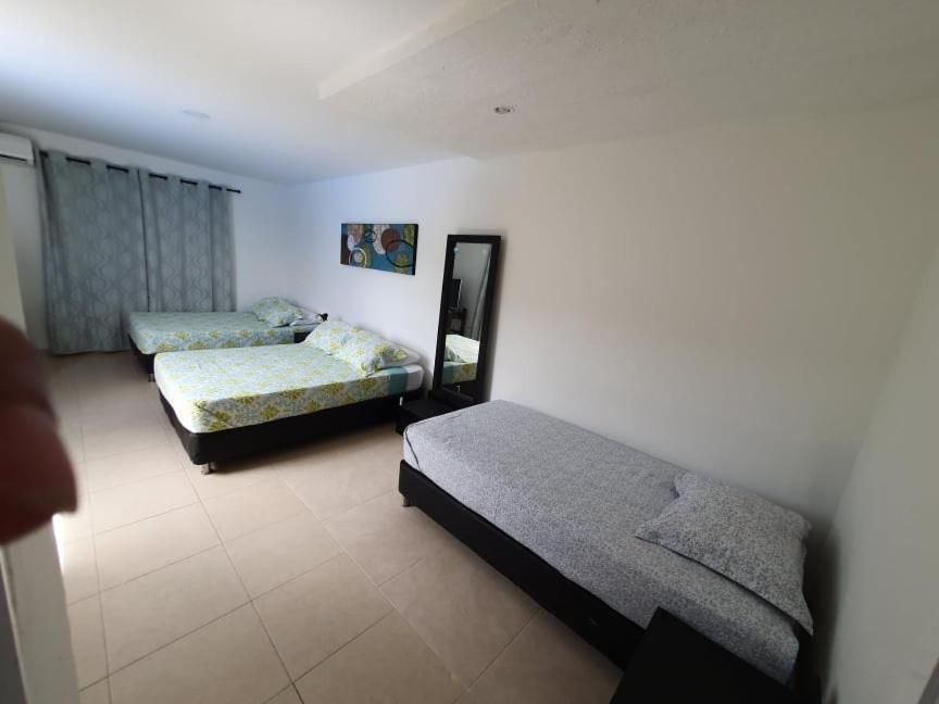 Postel nebo postele na pokoji v ubytování Apartamentos Sound Bay Beach