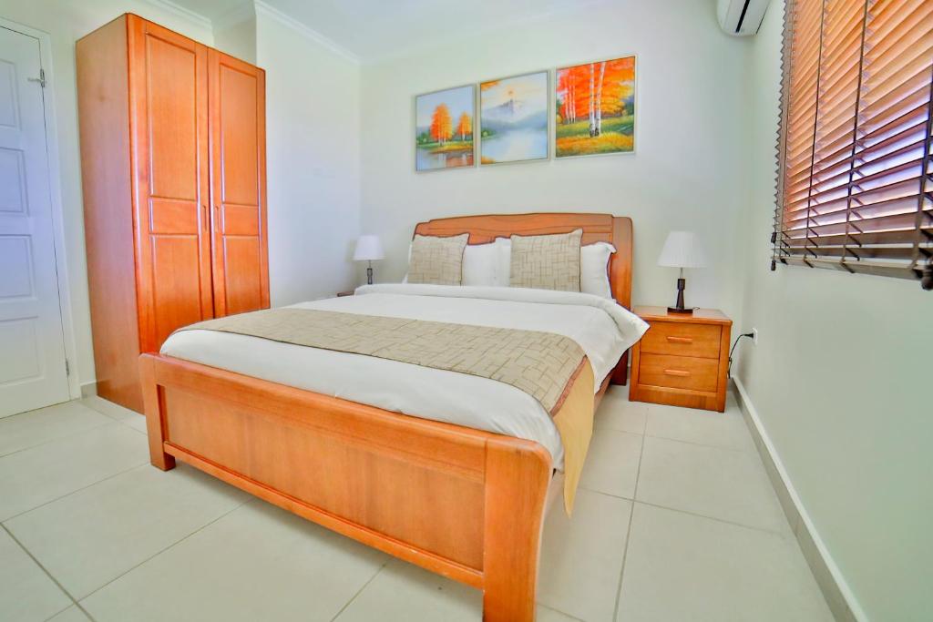 Letto o letti in una camera di Pearl Aruba Condos