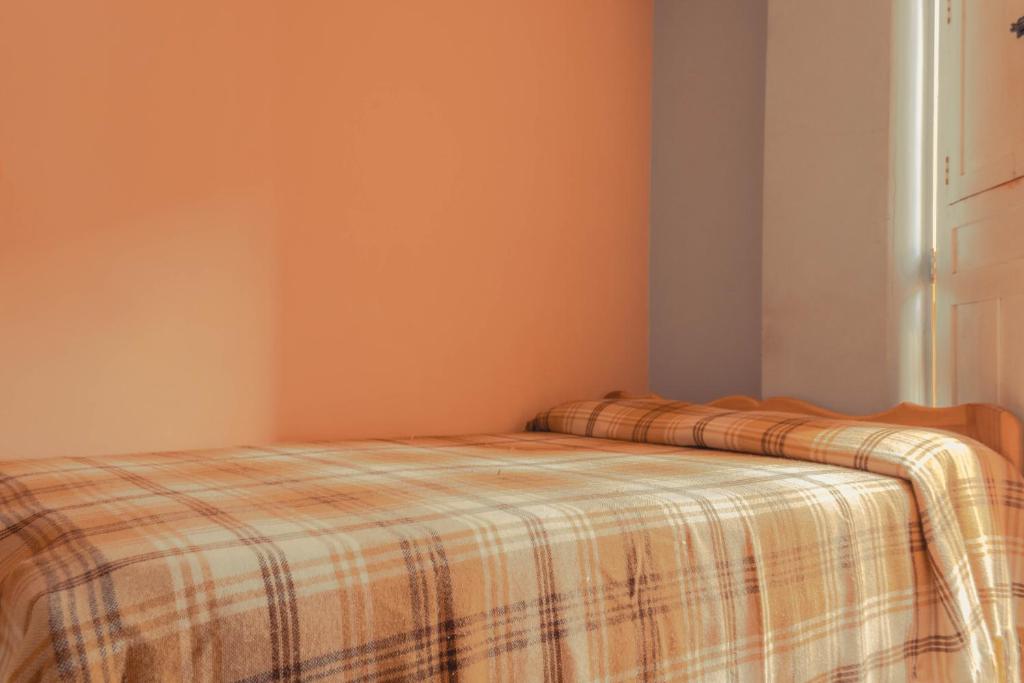 Postel nebo postele na pokoji v ubytování Hotel Felicina
