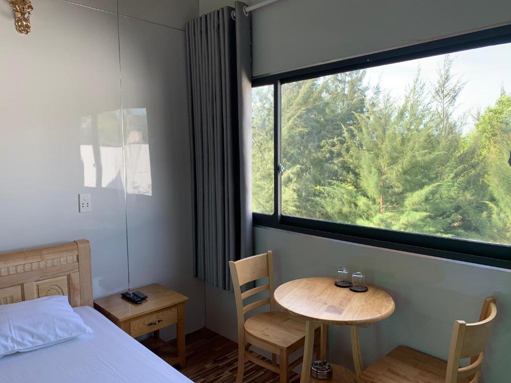 Postel nebo postele na pokoji v ubytování Mobile Home Ho Tram Pristine Beach