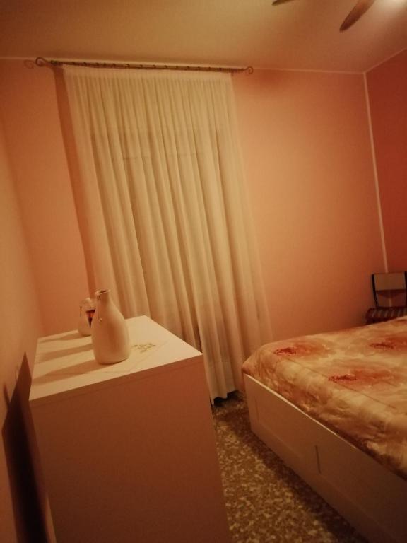 Postel nebo postele na pokoji v ubytování Aeroporto room