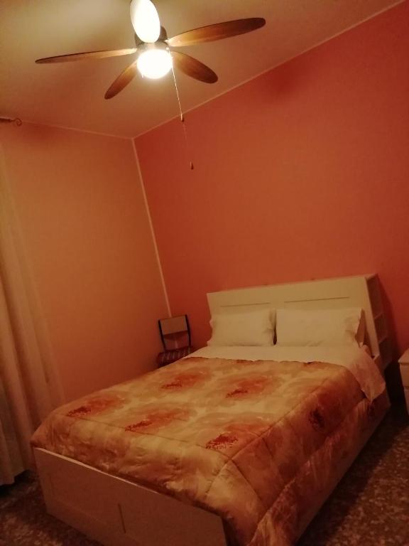 Postel nebo postele na pokoji v ubytování Aeroporto room